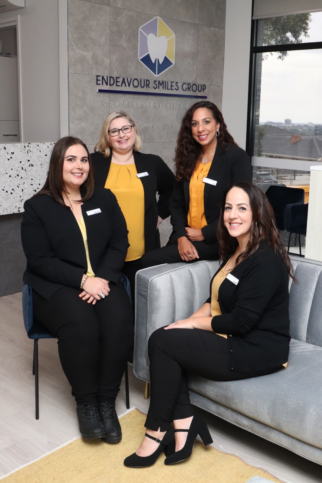 The reception and support team at Endeavour Smiles Group in the practice reception area