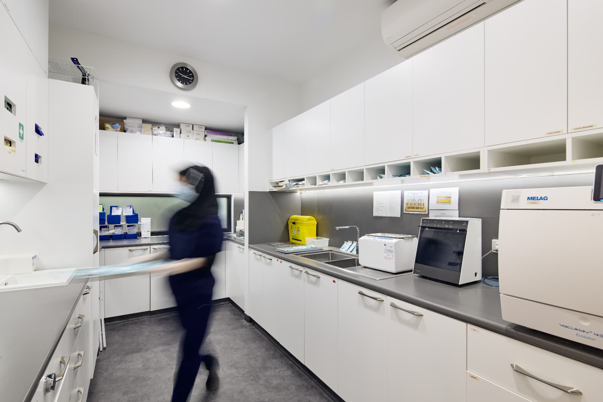Sterilisation room at Endeavour Smiles Group with an autoclave and sealed instrument trays